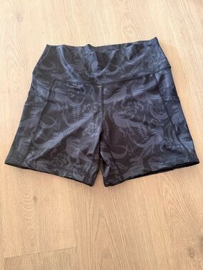 Black High-Waist Active Shorts with dinosaur print